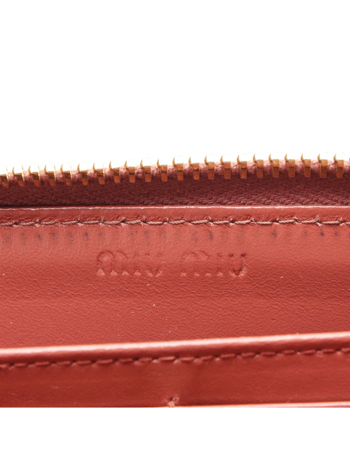 Embossed Leather Zippy Wallet